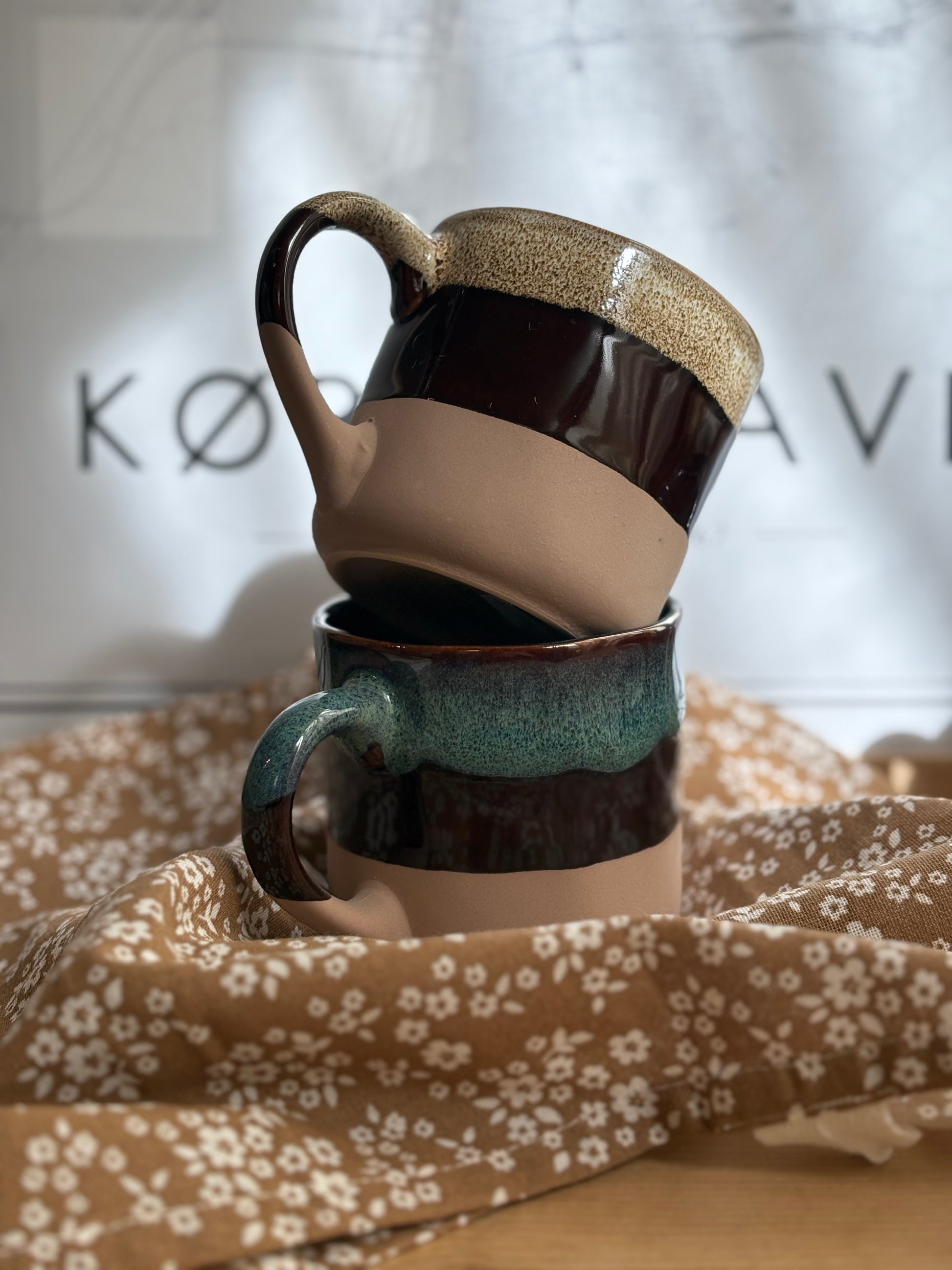 Det Gamle Apothek Tasse türkis/braun